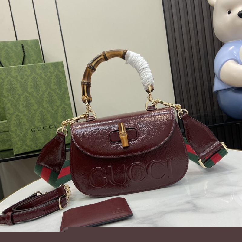 G*u*i top handle bags